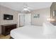 Comfortable bedroom with a view of the TV and an open door into the hallway at 3601 N Ocean Blvd. # 1840, North Myrtle Beach, SC 29582