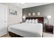 Comfortable bedroom with a queen bed, ceiling fan, and neutral decor at 3601 N Ocean Blvd. # 1840, North Myrtle Beach, SC 29582