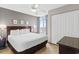 Bedroom featuring a large window with a view, a ceiling fan, and a closet at 3601 N Ocean Blvd. # 1840, North Myrtle Beach, SC 29582
