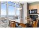 Bright dining area with floor to ceiling windows offering panoramic ocean views at 3601 N Ocean Blvd. # 1840, North Myrtle Beach, SC 29582