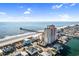 Stunning exterior elevation featuring the oceanfront condo building near the beach and pier at 3601 N Ocean Blvd. # 1840, North Myrtle Beach, SC 29582