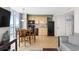 Inviting kitchen featuring tile floors, wooden cabinets, black appliances, and an adjacent dining area at 3601 N Ocean Blvd. # 1840, North Myrtle Beach, SC 29582