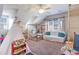 Large playroom with a play kitchen, tent, seating and a climbing structure at 364 Blackberry Ln., Myrtle Beach, SC 29579