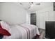 Comfortable bedroom with a cozy bed, closet space, and neutral wall color at 4506 W Harbour Ct. # U2, Little River, SC 29566