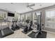 Well-equipped gym features treadmills, elliptical machines, and weightlifting equipment for residents at 4506 W Harbour Ct. # U2, Little River, SC 29566