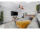 Open living space features a sectional sofa and adjacent kitchen with bar seating at 4506 W Harbour Ct. # U2, Little River, SC 29566