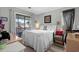 Serene bedroom with a comfortable bed, soft lighting, and access to an outdoor balcony at 4709 Cobblestone Dr. # F5, Myrtle Beach, SC 29577