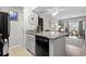 Well-lit eat-in kitchen area flowing into living space, enhancing the open concept at 4709 Cobblestone Dr. # F5, Myrtle Beach, SC 29577
