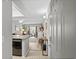 Bright living area with view from kitchen, featuring modern decor and plenty of natural light at 4709 Cobblestone Dr. # F5, Myrtle Beach, SC 29577