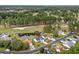 Beautiful aerial view of a neighborhood, with a home overlooking a pond and golf course at 5215 Southern Trail, Myrtle Beach, SC 29579