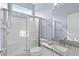 Bathroom features shower with glass door and sink with granite countertops at 5215 Southern Trail, Myrtle Beach, SC 29579