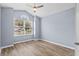 Bedroom features hardwood floors, vaulted ceiling, a ceiling fan, and plenty of natural light at 5215 Southern Trail, Myrtle Beach, SC 29579
