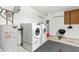 This garage is equipped with a washer and dryer and plenty of room for storage at 5215 Southern Trail, Myrtle Beach, SC 29579
