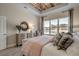 Comfortable bedroom showcasing wood ceiling, large window with a beautiful waterfront view, and soft decor at 2505 Brescia St., Myrtle Beach, SC 29579