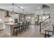 Spacious, modern kitchen with a large center island, sleek appliances, and an open layout to the living area at 2505 Brescia St., Myrtle Beach, SC 29579