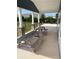 Covered outdoor picnic area with stone pillars and views of the landscaped yard at 2505 Brescia St., Myrtle Beach, SC 29579