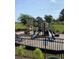 Community playground with slides, climbing structures, and cushioned ground cover at 2505 Brescia St., Myrtle Beach, SC 29579
