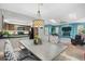 Open view of a living area and dining area with table and chairs at 5520 N Kings Hwy., Myrtle Beach, SC 29577