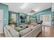 Spacious living room with skylights, fireplace, and comfortable seating, perfect for relaxing and entertaining at 5520 N Kings Hwy., Myrtle Beach, SC 29577