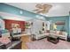 Open-concept living room with hardwood floors and views into the dining area and kitchen at 5520 N Kings Hwy., Myrtle Beach, SC 29577