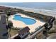Enjoy stunning aerial views of the beach, community pool, and manicured landscaping at 5905 South Kings Hwy. # 4309, Myrtle Beach, SC 29575