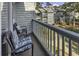 Relax on this private balcony with comfortable chairs overlooking lush surroundings at 5905 South Kings Hwy. # 4309, Myrtle Beach, SC 29575
