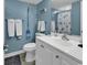 Cozy bathroom featuring blue walls, beachy decor, and a classic white vanity at 5905 South Kings Hwy. # 4309, Myrtle Beach, SC 29575