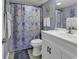Charming bathroom featuring seashell accents, a patterned shower curtain, and white vanity at 5905 South Kings Hwy. # 4309, Myrtle Beach, SC 29575