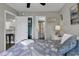 Bright bedroom with a view to the kitchen, closet, and bathroom for a clean and airy space at 5905 South Kings Hwy. # 4309, Myrtle Beach, SC 29575