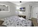 Bright bedroom with a wall-mounted TV and beach-themed decor for an airy space at 5905 South Kings Hwy. # 4309, Myrtle Beach, SC 29575