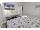 Comfortable bedroom with a mounted TV, dresser, and a view of the doorway at 5905 South Kings Hwy. # 4309, Myrtle Beach, SC 29575