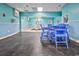 Indoor pool area with blue walls and a table with chairs at 5905 South Kings Hwy. # 4309, Myrtle Beach, SC 29575