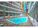 Enjoy an indoor pool, surrounded by seating and colorful decor at 5905 South Kings Hwy. # 4309, Myrtle Beach, SC 29575