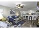 Open-concept living room with stylish furnishings, a breakfast bar, and a view of the kitchen, great for modern living at 5905 South Kings Hwy. # 4309, Myrtle Beach, SC 29575