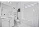 Clean bathroom featuring a vanity, toilet, and shower-tub combination with white tile at 611 Cattle Drive Circle, Myrtle Beach, SC 29588