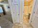Tiled floor leads to a bathroom with a shower-tub combo at 635 Waterway Village Blvd. # 12-I, Myrtle Beach, SC 29579