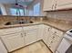 Functional kitchen with granite countertops, modern appliances, and ample cabinet space at 635 Waterway Village Blvd. # 12-I, Myrtle Beach, SC 29579
