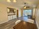 Bright open-concept living and dining room with access to outdoor patio and golf course view at 635 Waterway Village Blvd. # 12-I, Myrtle Beach, SC 29579
