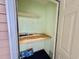 Unfinished storage space with shelving and light blue accent paint at 635 Waterway Village Blvd. # 12-I, Myrtle Beach, SC 29579