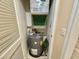 A utility closet features a water heater at 635 Waterway Village Blvd. # 12-I, Myrtle Beach, SC 29579