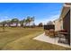 Picturesque backyard featuring a patio and grill at 6614 Torino Lane, Myrtle Beach, SC 29572