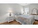 Cozy bedroom featuring natural light and stylish decor at 6614 Torino Lane, Myrtle Beach, SC 29572