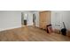 Bedroom with hardwood floors; next to doorway to bathroom, plus cabinets for storage at 6614 Torino Lane, Myrtle Beach, SC 29572