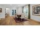 Dining area featuring a wooden table, comfortable chairs, and stylish rug at 6614 Torino Lane, Myrtle Beach, SC 29572