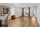 Living room with wood floors and ample natural light at 6614 Torino Lane, Myrtle Beach, SC 29572