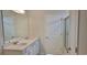 Bathroom features a double sink vanity, a large mirror, and a glass door shower at 684 Mccorkle Place, Conway, SC 29526