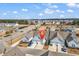 Aerial view of townhomes showcasing the beautiful community with nearby pond and convenient location at 801 San Marco Ct. # C, Myrtle Beach, SC 29579