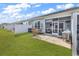 This cozy backyard features a screened-in patio area for outdoor relaxation at 801 San Marco Ct. # C, Myrtle Beach, SC 29579