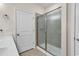 Bathroom features a white vanity, door to the exterior and a glass shower at 801 San Marco Ct. # C, Myrtle Beach, SC 29579