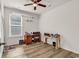 Bright bedroom featuring neutral walls, wood-look floors, and a window at 801 San Marco Ct. # C, Myrtle Beach, SC 29579